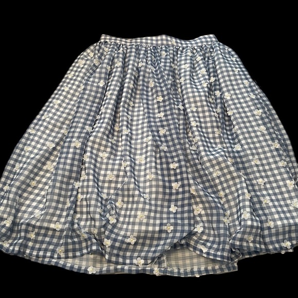 Unique Vintage Magnolia Place. Blue gingham knee-length skirt & sewn on flowers. - Picture 2 of 10